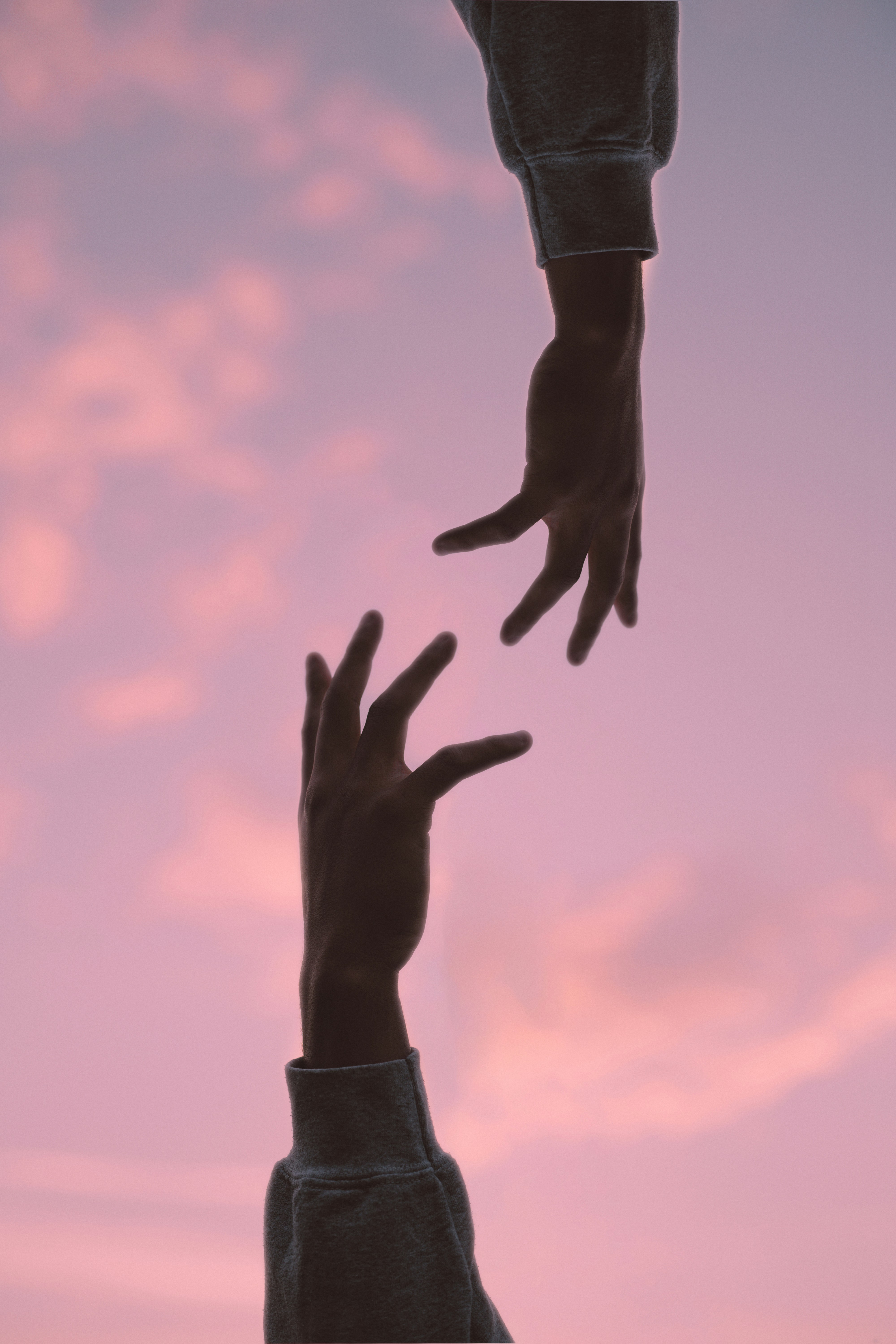 Two hands reaching